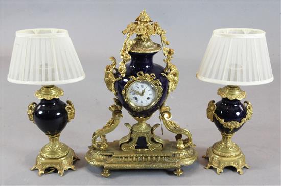 A French ormolu and bleu du rois porcelain clock garniture, 13in.